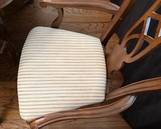 W1 - $250. Universal Furniture Dining Room Table & Chairs. Measures 44.5" wide x 70" deep x 29.5" tall. Has 2 leaves that add 15" each. 2 Captains, 4 regular chairs. Some seats have stains and 1 chair arm is wiggly.