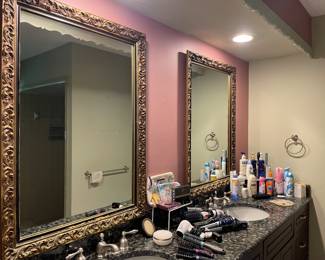 Two ornate mirrors