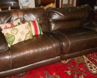 Leather recliner sofa, some damage to back