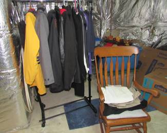 MEN'S CLOTHING: Racks of coats, suits, shirts, pants, shorts, shoes (size 13): Clothing is mostly LG/XL/ size 38x32