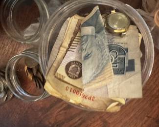 some foreign coins and bills