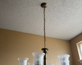 Brushed nickel chandelier approximately
20h x 27w. Works