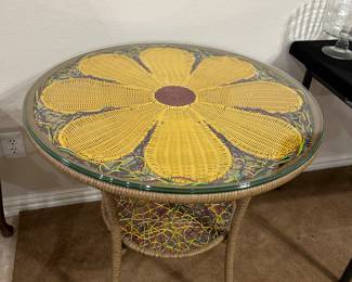 Whimsical wicker & glass floral accent table