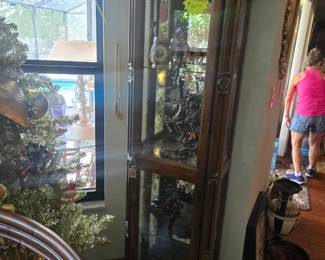 Small curio cabinet,with horse statues