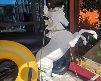 There are alot of these resin or vinyl animals around the house from a wolf pack to a horse to 2 squirrels and a unicorn...