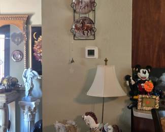 Carousel horse lamp,plate rack with horse plates and a vase with horses