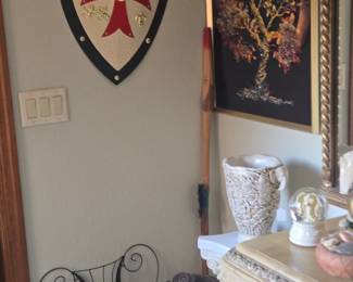 Metal knights shield...Lg leather horse as well as a metal art Harper type piece..a pedestal with a scenic urn..