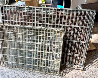 Various sizes of dog crates
