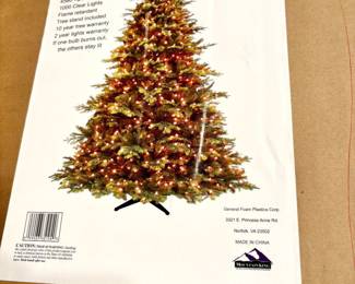 Large pre-lit Christmas tree in box