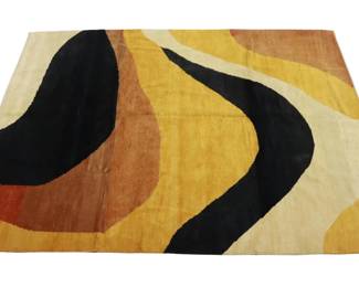 A bold and sculptural hand-tied wool rug from India, featuring an abstract organic design in rich earth tones—ochre, rust, black, and cream. Measuring approximately 11'6" x 8'10", this generously sized piece evokes mid-century and 1970s influences, making it a striking addition to contemporary or vintage-inspired interiors.
