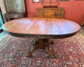 Carved Lion Pedestal Table