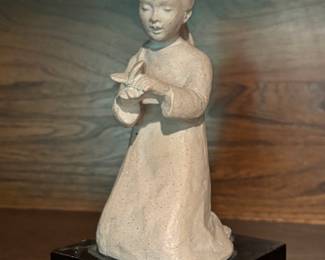 Austin Productions Girl Holding Butterfly