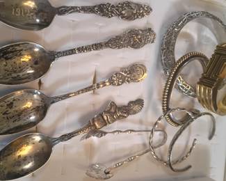 Ornate sterling spoons, bracelets and designer bracelets 