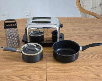 Pots, toaster and grater
