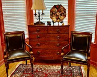 Pair of exquisite antique dolphin arm chairs in gilt edged black leather circa 1920