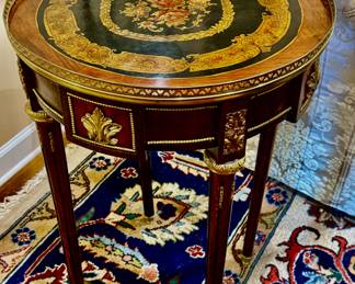 French Louis XVI side table, also known as a gueridon or bouillotte table, featuring intricate intarsia and ormolu details…pair available