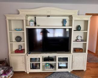 Large entertainment center. Items on or in it are sold separately.