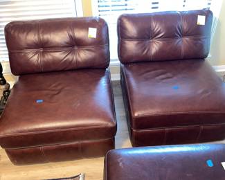 Pair of armless leather chairs