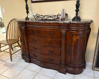 Fabulous marble top shaped buffet