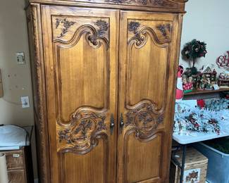 MAGNIFICENT HAND CARVED ARMOIRE