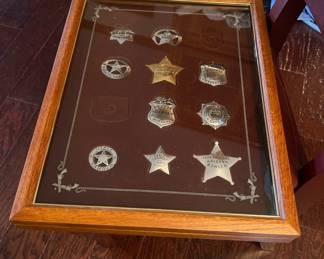 This image displays "The Official Badges Of The Great Western Lawmen" collection by The Franklin Mint, typically featuring sterling silver badges, with some potentially including 24k gold accentsFranklin Mint/ The Official Badges Of The Great Western Lawmen *Sterling Silver