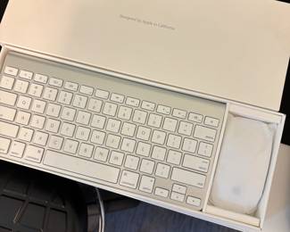 brand new Apple keyboard with mouse