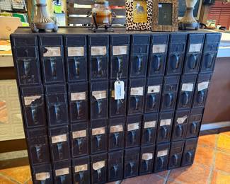 Vintage filing cabinet. $1,599.95 Measures approximately 50 1/2"W x15"Dx43"T C2418