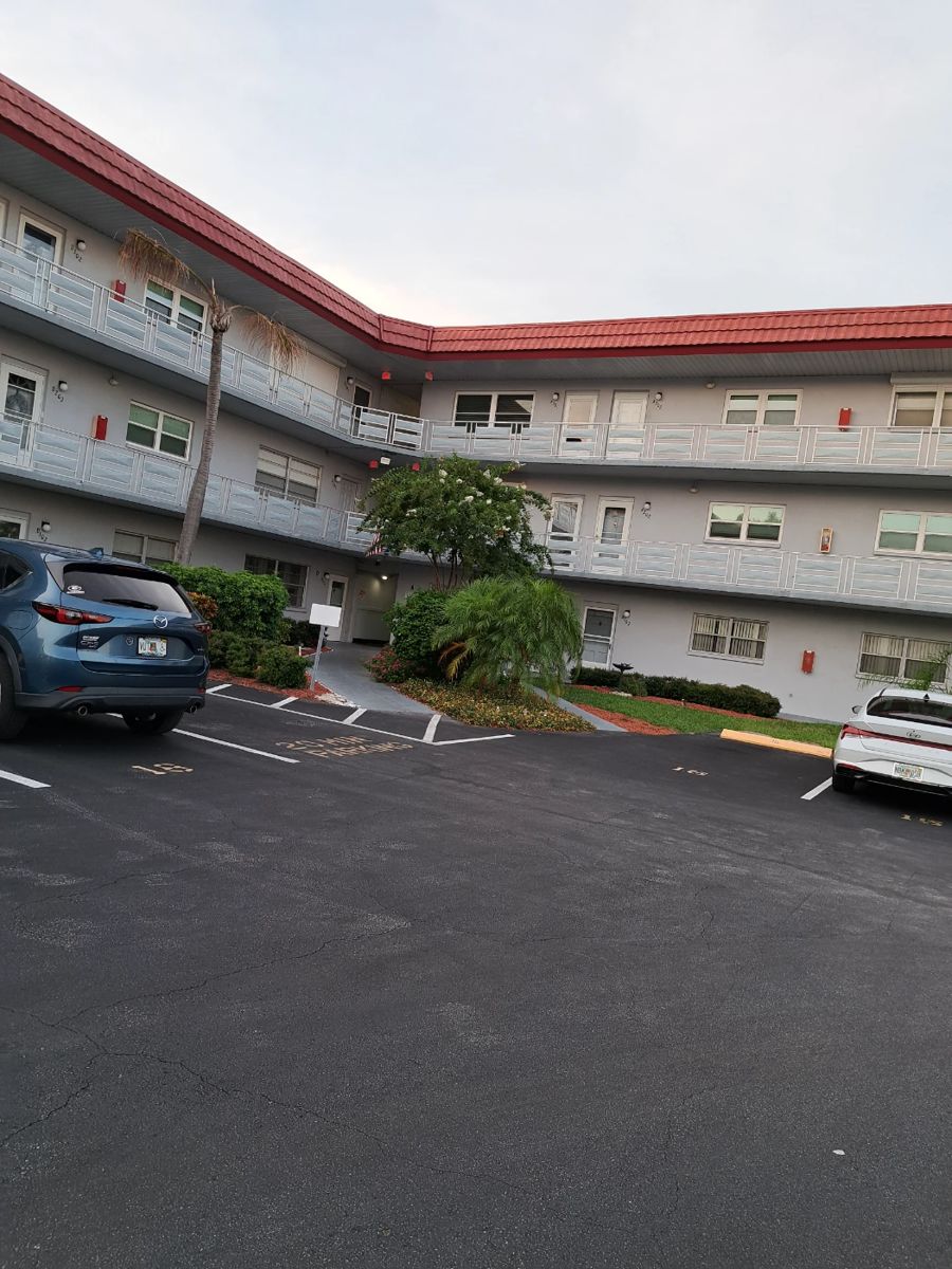 BERKSHIRE ENTRANCE IN THE MIDDLE OF THE 2 WINGS - BE SURE TO PARK IN GUEST MARKED SPOTS AND NOT IN ASSIGNED NUMBERED SPOTS