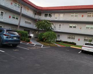 BERKSHIRE ENTRANCE IN THE MIDDLE OF THE 2 WINGS - BE SURE TO PARK IN GUEST MARKED SPOTS AND NOT IN ASSIGNED NUMBERED SPOTS