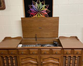 Great stereo cabinet and string wall art