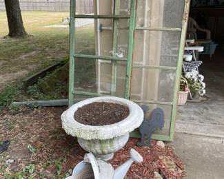 Cement, flower pot, cool old windows, sprinkling can