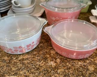 pink and white pyrex with lids