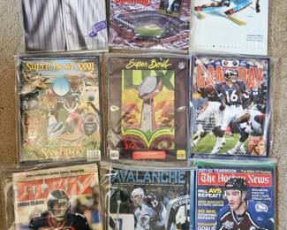 Super Bowl programs. Rockies Scorecard magazines. 