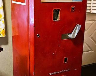 1950s Coca-Cola machine. This baby still keeps them ice cold.