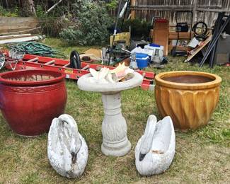 Large, heavy pots. Swan planters. Concrete bird bath.