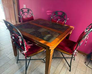 table and chairs iron chairs with cushions table with inlay slate inlay