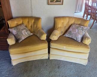 Vintage swivel club chairs