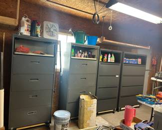 Several metal cabinets on wheels