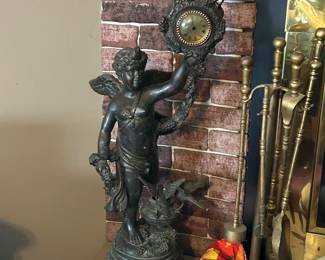 Cast iron cherub clock