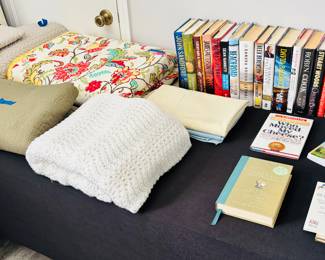 Of course, you need a warm blanket to wrap up with as you read a book. A bourbon doesn't hurt either.