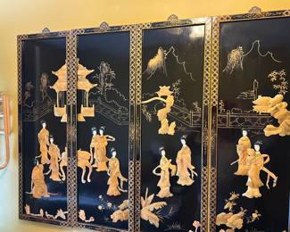 Four Chinese black lacquer wall panels