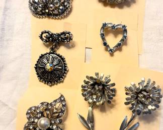 Silvertone and rhinestone vintage brooches