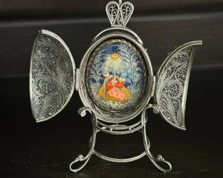 Russian silver Filigree egg with hand-painted porcelain interior