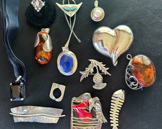 Sterling silver pendants and pins