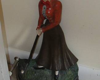 Door stop woman golfing