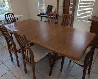 Skovby teak dining table. Made in Denmark MCM mid century table with 6 chairs