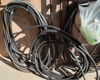 3 black Garden Hoses, 1 green other