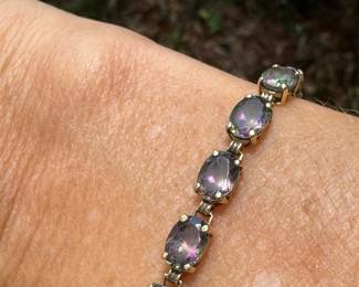 10kt white gold synthetic Alexandrite, size 7 1/2", 8.52 grams, $200