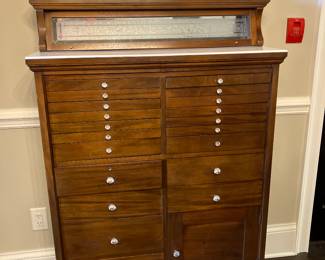 49 $650.00 Antique dental cabinet with original milk glass inserts 36x12 1/2 x54T