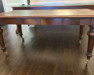 43 - $600 - Polo Ralph Lauren large mahogany table leather insert tapered legs brass casters 65Wx35Dx30H - 2 drawers
